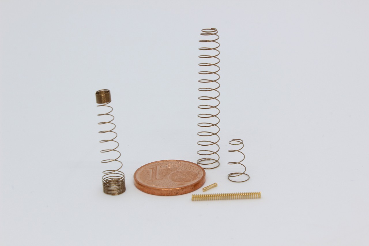 Golden, conical and variable pitch Microsprings